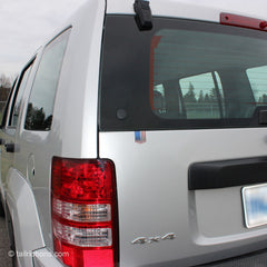 American Flag car sticker on a Jeep