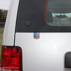 Flag of the USA car sticker on a Jeep